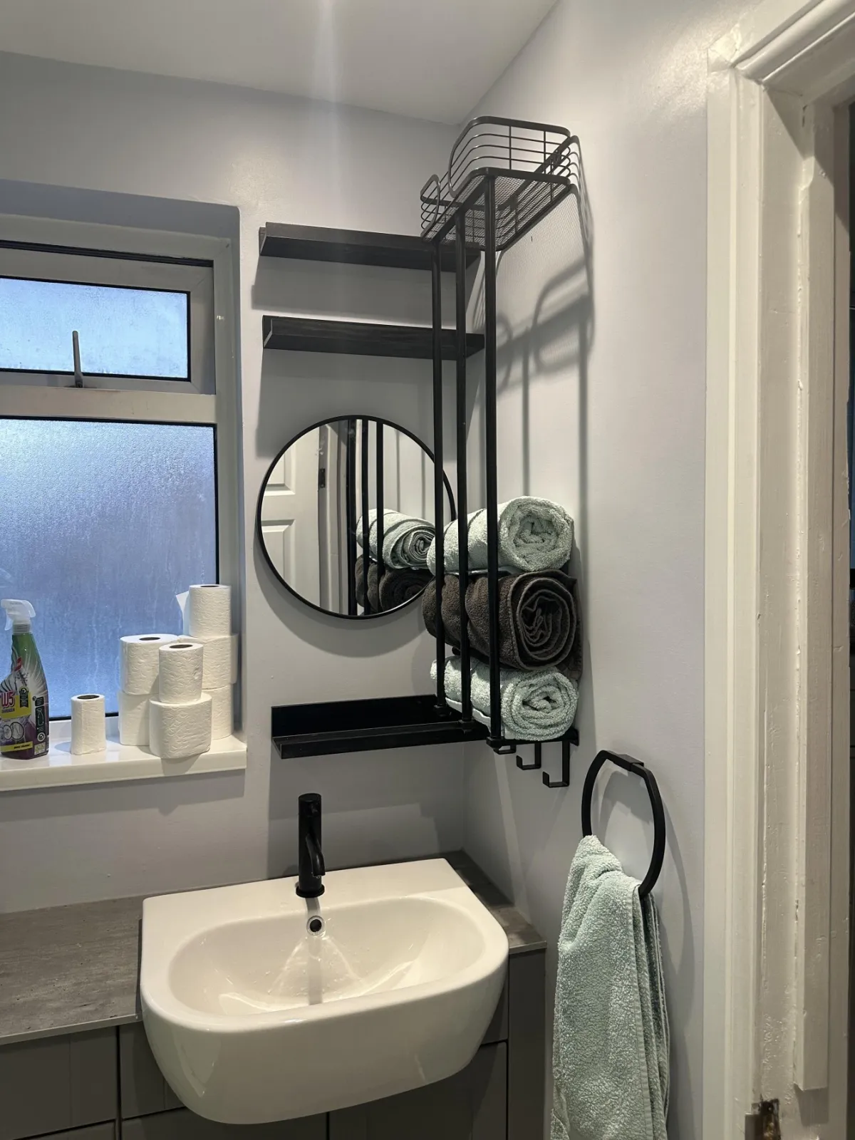 Shower room with glass splashbacks gallery