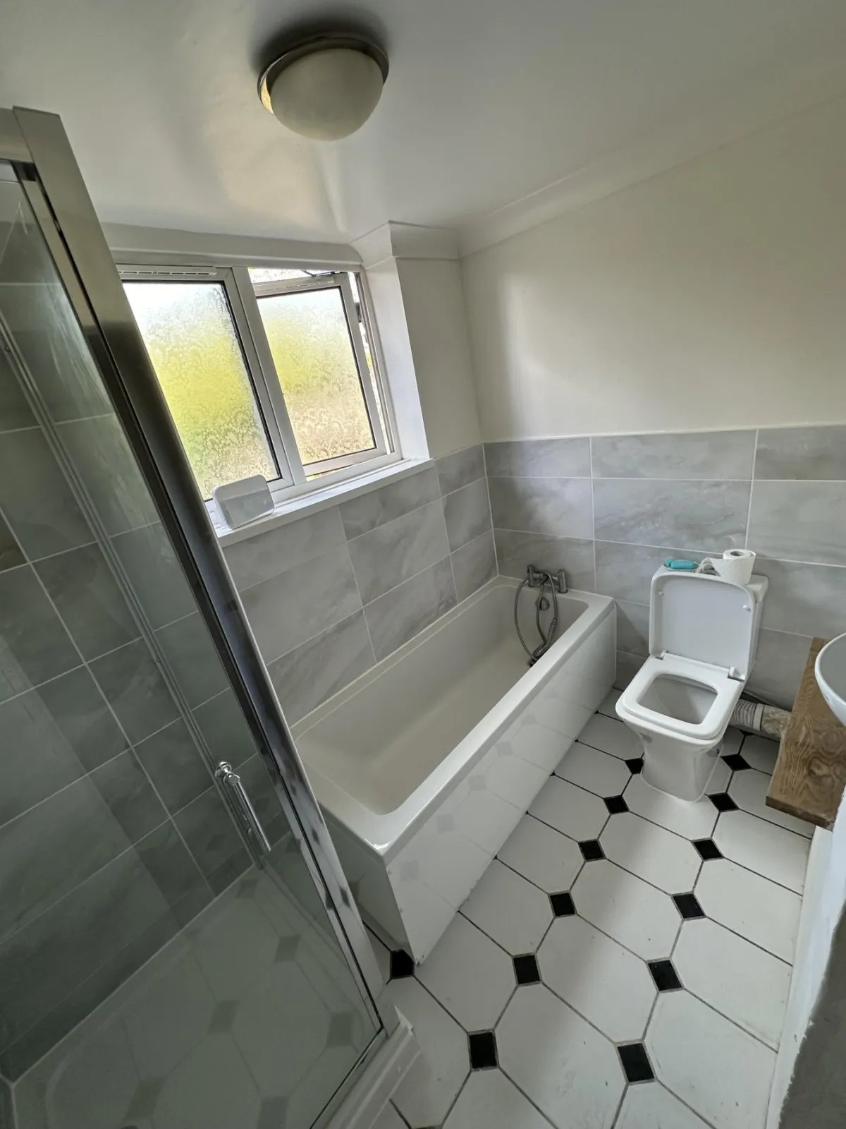 Family bathroom with separate shower